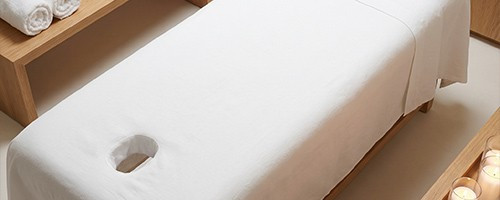 Draps de table de massage avec trou